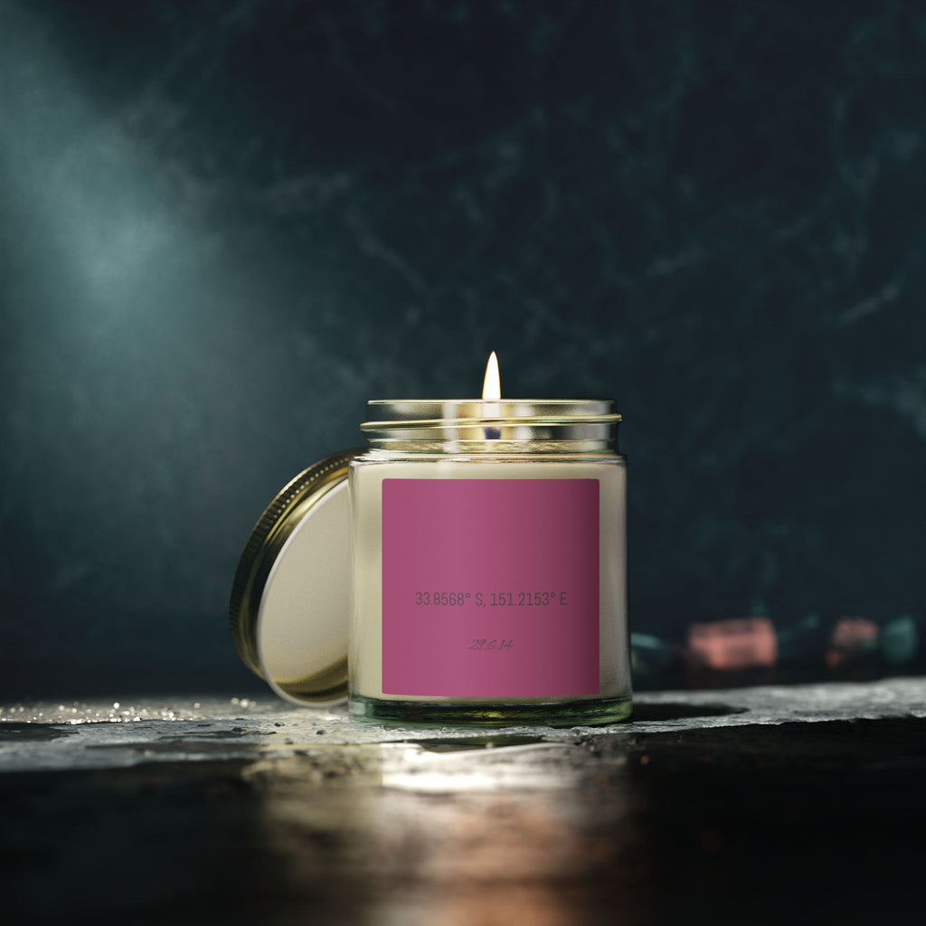 Clear jar candle with your coordinates on a dark table